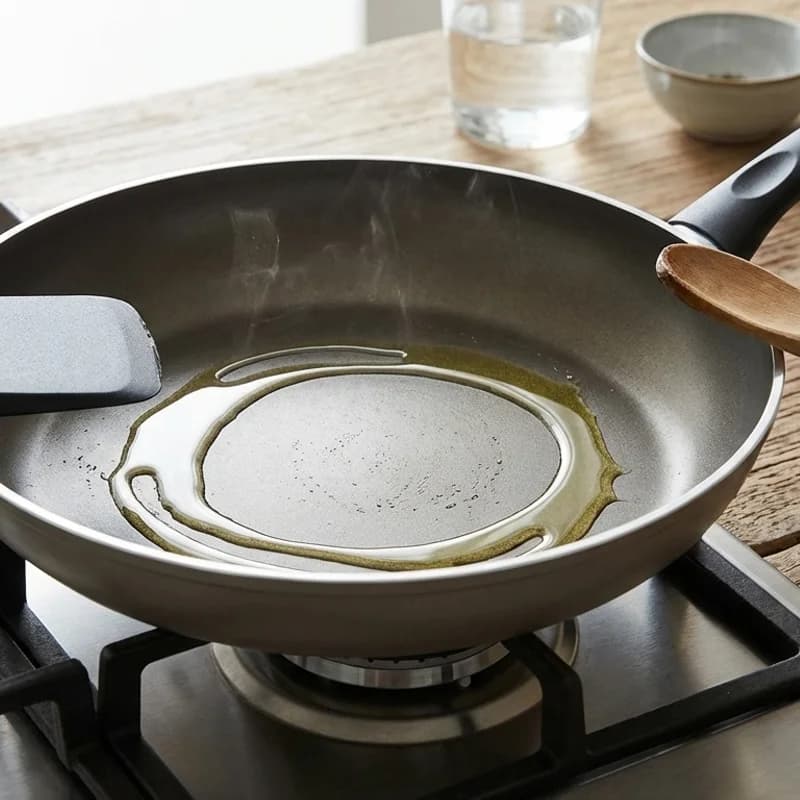 Step 1: Heat olive oil in a large skillet over medium heat.